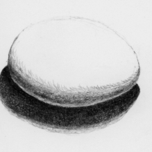 Drawing of egg, lit from above.